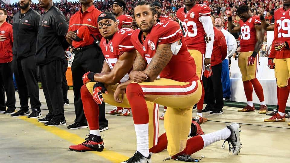 NFL players take a knee to protest