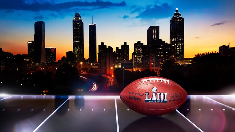 Super Bowl 53 football in front of Atlanta skyline