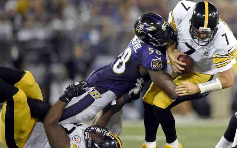 Steelers QB getting sacked by the Ravens